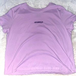 A light purple cropped T-shirt. 💜